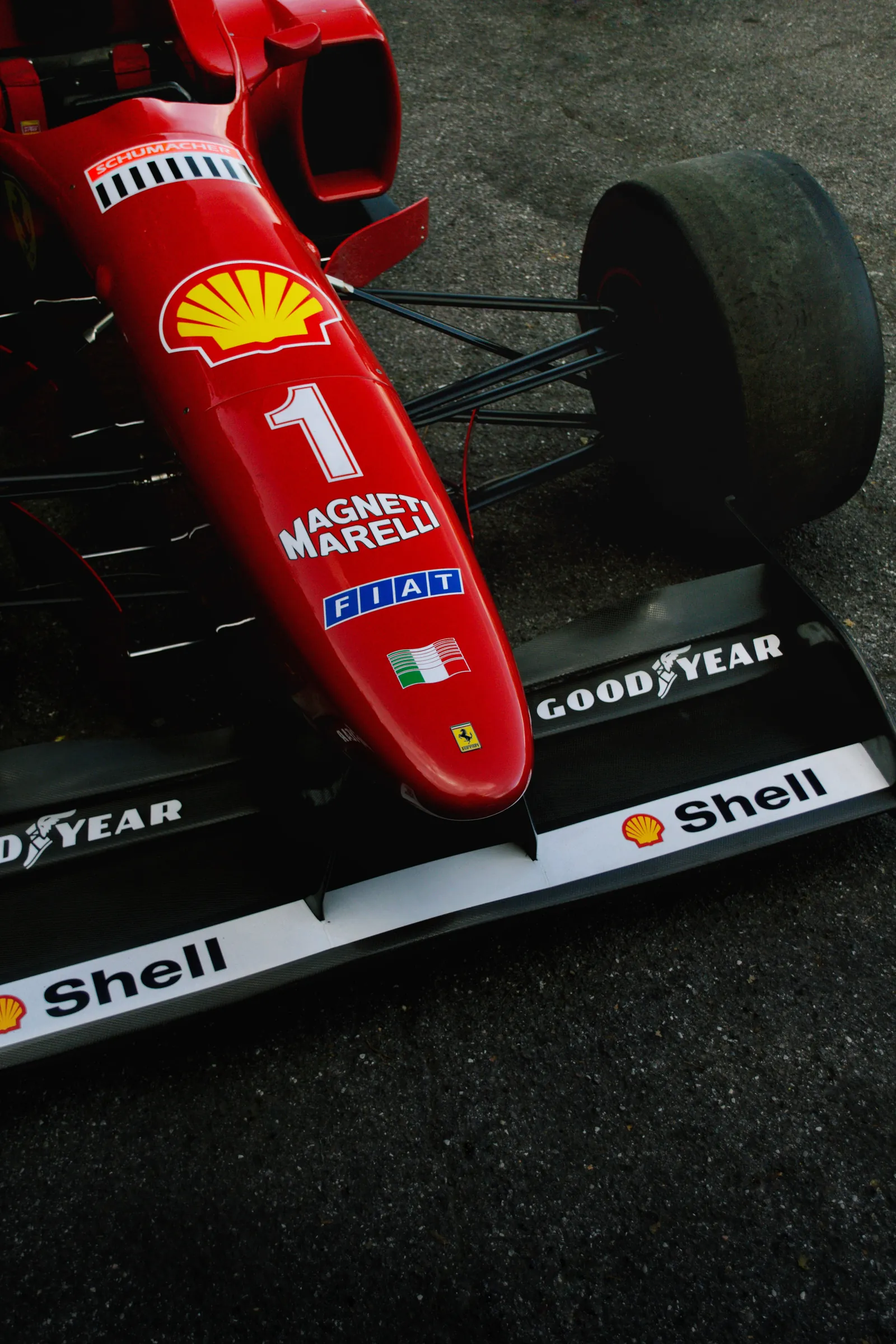 Nose of a red Ferrari Formula 1 car with Shell livery